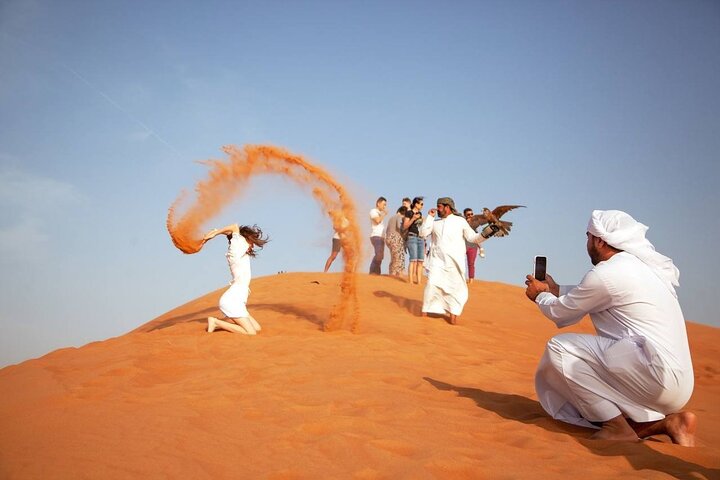 Evening desert safari in Dubai with dune bashing, quad biking, camel rides, and BBQ dinner, photo 9 | wizardtrip