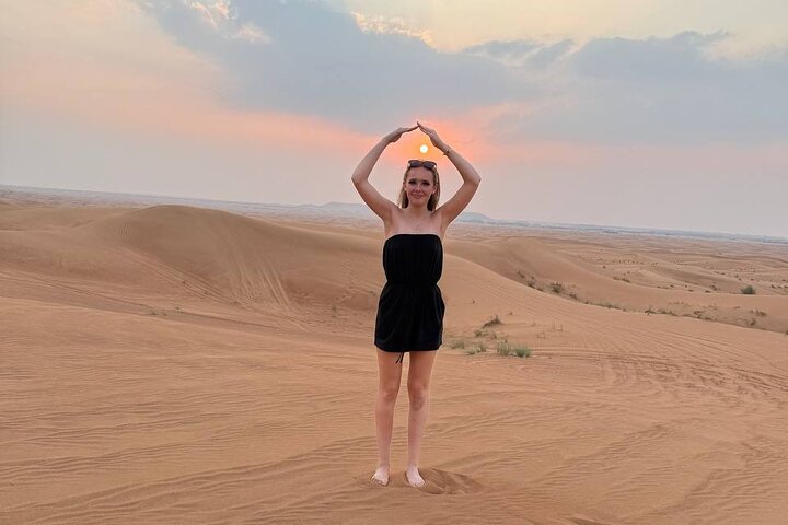 Evening desert safari in Dubai with dune bashing, quad biking, camel rides, and BBQ dinner, photo 19 | wizardtrip
