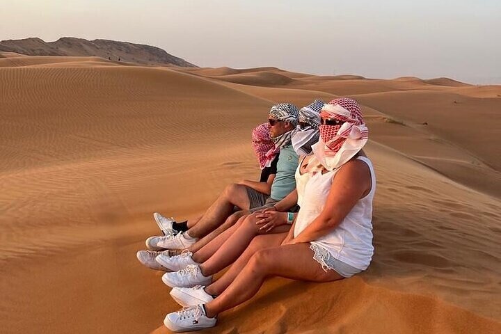 Evening desert safari in Dubai with dune bashing, quad biking, camel rides, and BBQ dinner, photo 20 | wizardtrip