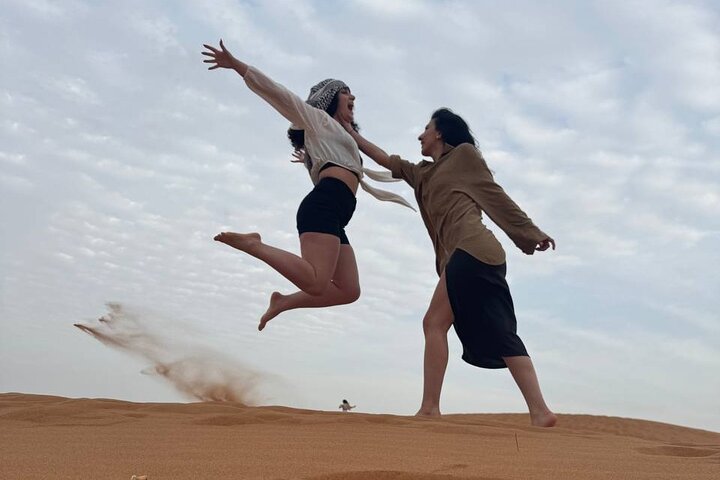 Evening desert safari in Dubai with dune bashing, quad biking, camel rides, and BBQ dinner, photo 23 | wizardtrip