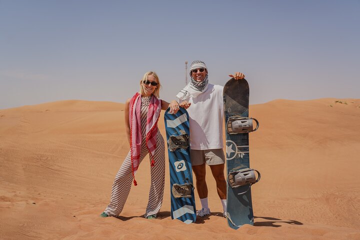 Experience a thrilling Dubai desert safari with dune bashing, quad biking, camel rides, and a BBQ dinner, photo 6 | wizardtrip