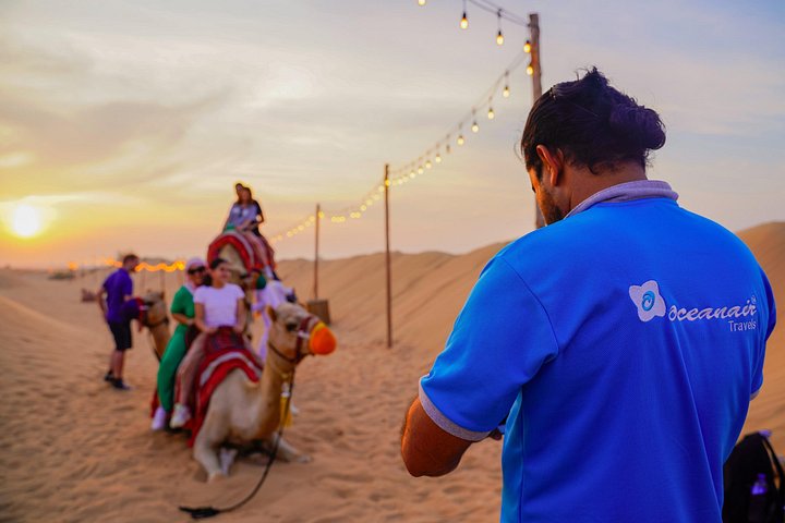 Experience a thrilling Dubai desert safari with dune bashing, quad biking, camel rides, and a BBQ dinner, photo 10 | wizardtrip