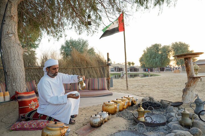 Experience a thrilling Dubai desert safari with dune bashing, quad biking, camel rides, and a BBQ dinner, photo 16 | wizardtrip