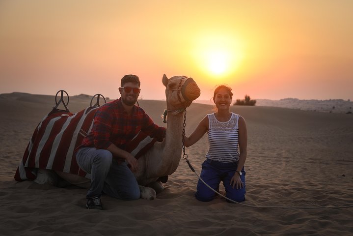 Experience a Dubai desert sunset camel ride with BBQ dinner and traditional camp activities, photo 6 | wizardtrip