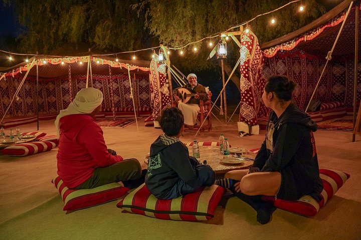 Experience a Dubai desert sunset camel ride with BBQ dinner and traditional camp activities, photo 14 | wizardtrip