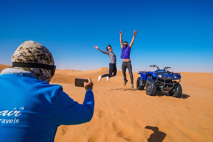 Avventura in quad nel deserto di Dubai con giri in cammello, cena BBQ e osservazione delle stelle, foto 8 | wizardtrip