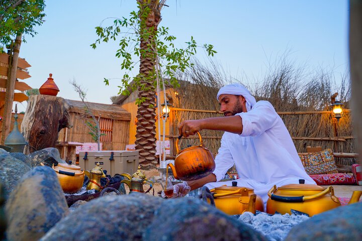 Avventura in quad nel deserto di Dubai con giri in cammello, cena BBQ e osservazione delle stelle, foto 10 | wizardtrip