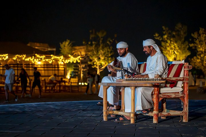 Avventura in quad nel deserto di Dubai con giri in cammello, cena BBQ e osservazione delle stelle, foto 23 | wizardtrip