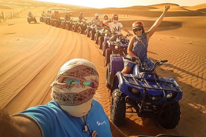 Avventura in quad nel deserto di Dubai con giri in cammello, cena BBQ e osservazione delle stelle, foto 29 | wizardtrip