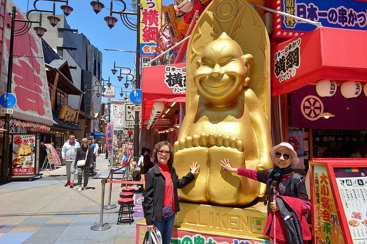 Um passeio a pé personalizado por Osaka, ruas vibrantes, mercados e locais históricos com um guia local, foto 43 | wizardtrip